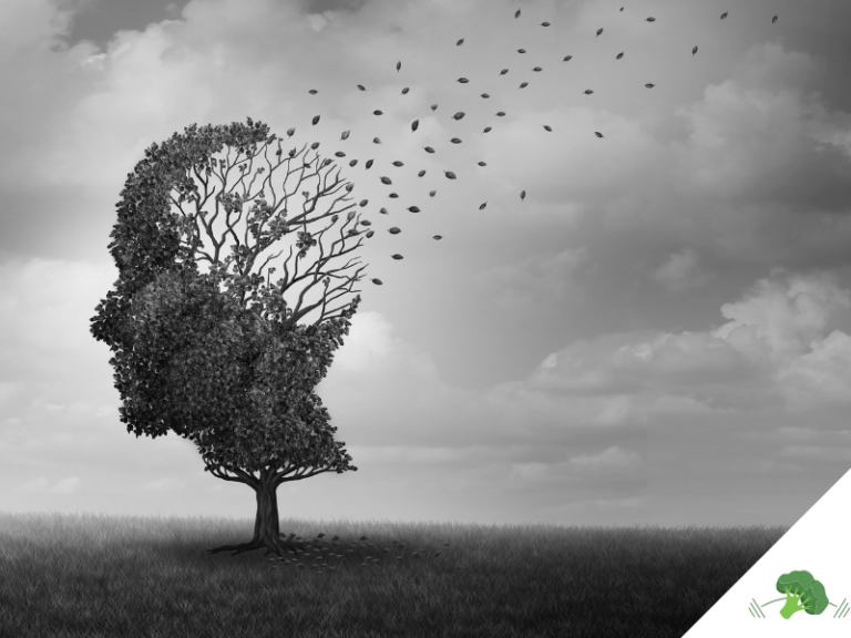 Ein Baum in Form eines menschlichen Kopfes verliert seine Blätter, beginnend im Bereich des Gehirns – eine symbolische Darstellung für geistigen Verfall, wie er bei Alzheimer oder anderen neurodegenerativen Erkrankungen auftreten kann.